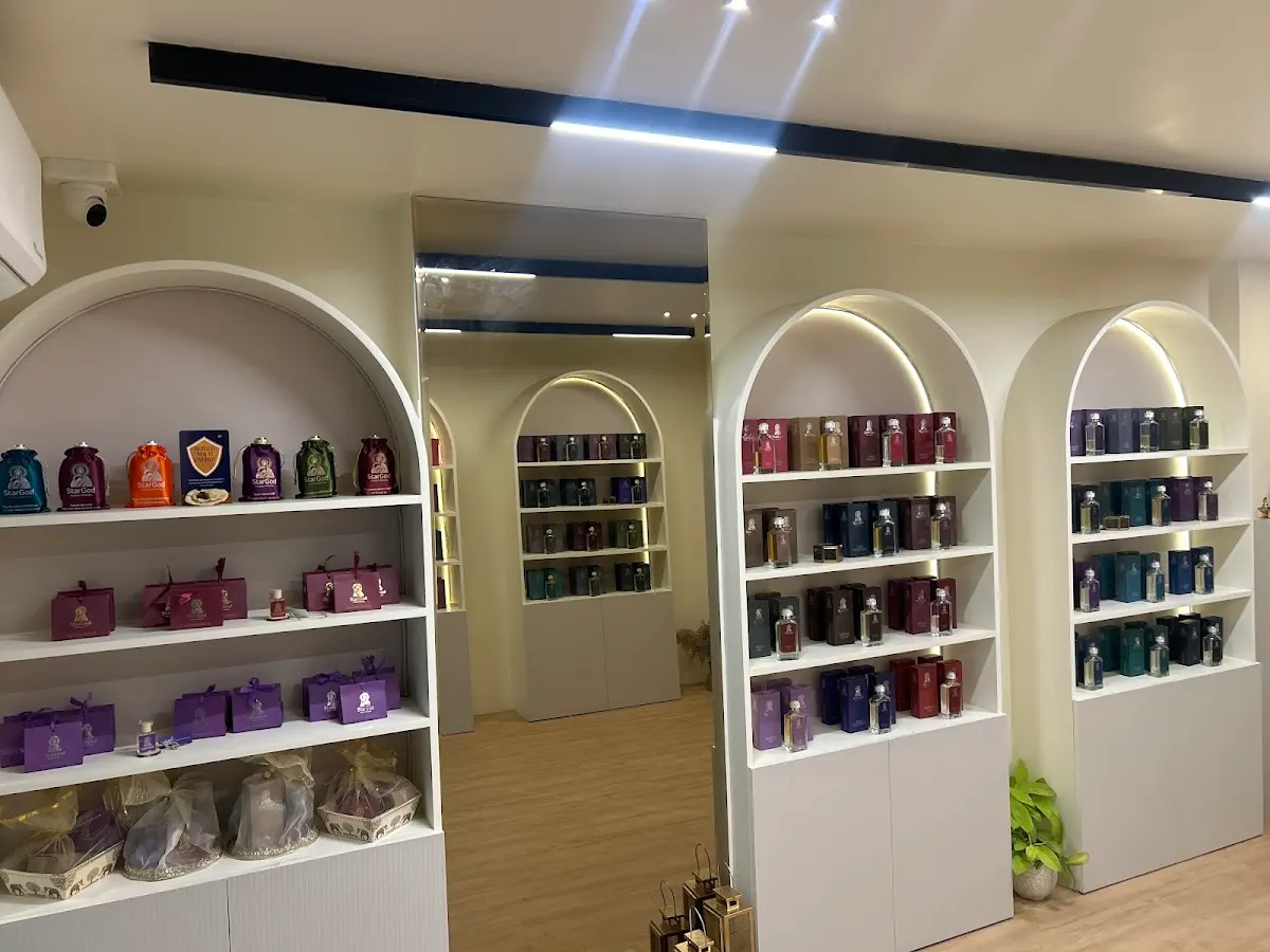 Arched perfume shelves and gift hampers inside the store